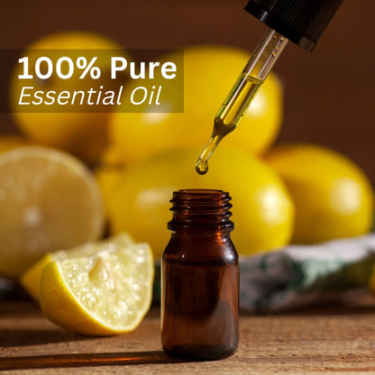 Aroma Treasures Lemon Pure Essential Oil bottle with lemon slices and fresh lemon zest on a white background.