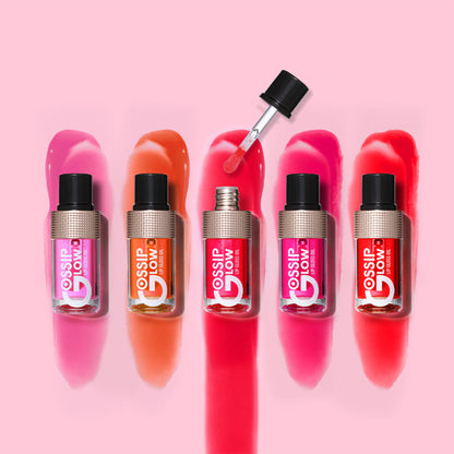 Character Gossip Glow Lip Gloss Oil in Pink Punch 03 with shiny, glossy finish and vibrant pink color, perfect for a luminous lip look.