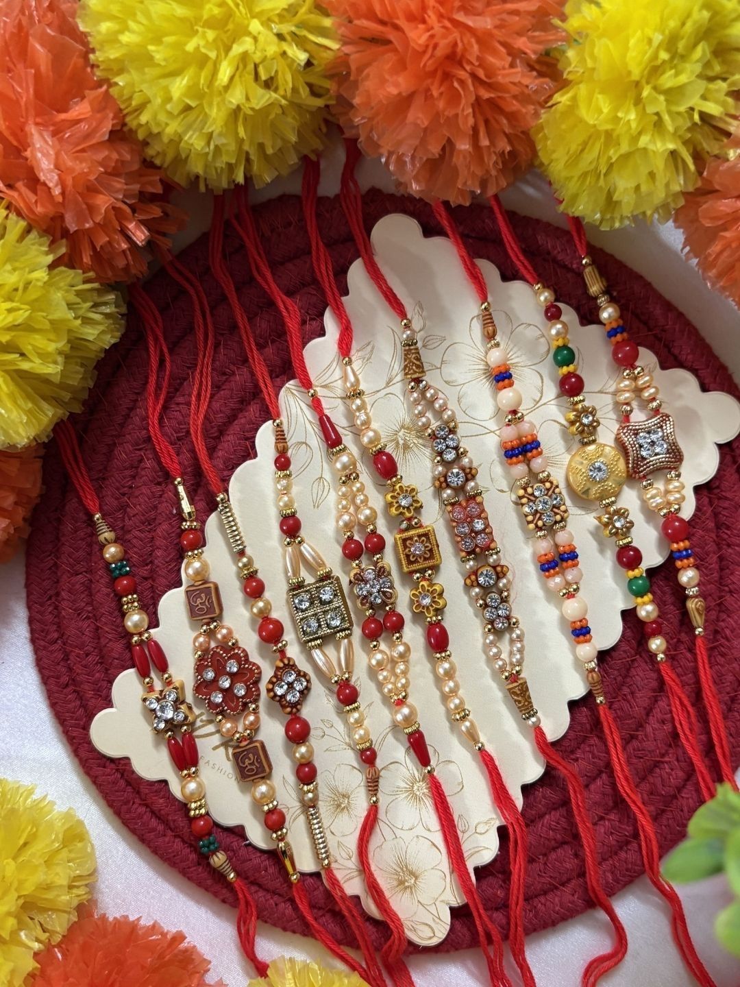 Anouk Set Of 10 Artificial Stones & Beads Thread Rakhi With Roli Chawal Chandan Mishri