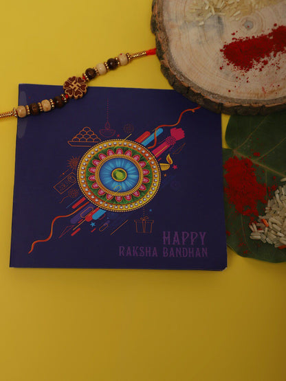 Anouk Unisex Red Swastik Charm & Beaded Rakhi With Roli Chawal & Greetings Card