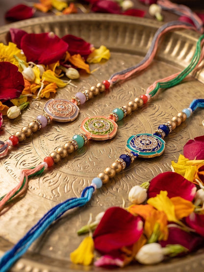 Anouk Set Of 3 Floral Design Multicolor Artificial Beads Thread Rakhi With Roli Chawal