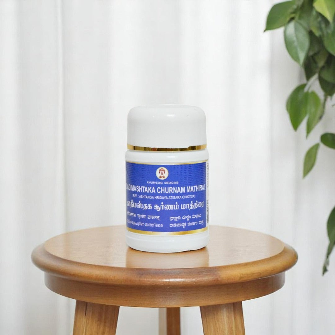 Impcops Dadimashtaka Churnam Ayurvedic tablets in a jar, showing the herbal churna for traditional health support.