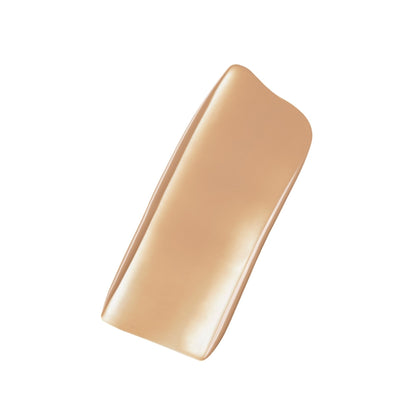 Bottle of Estee Lauder Futurist Skin Tint Serum SPF 20 in Desert Beige, featuring a sleek packaging and light beige shade.