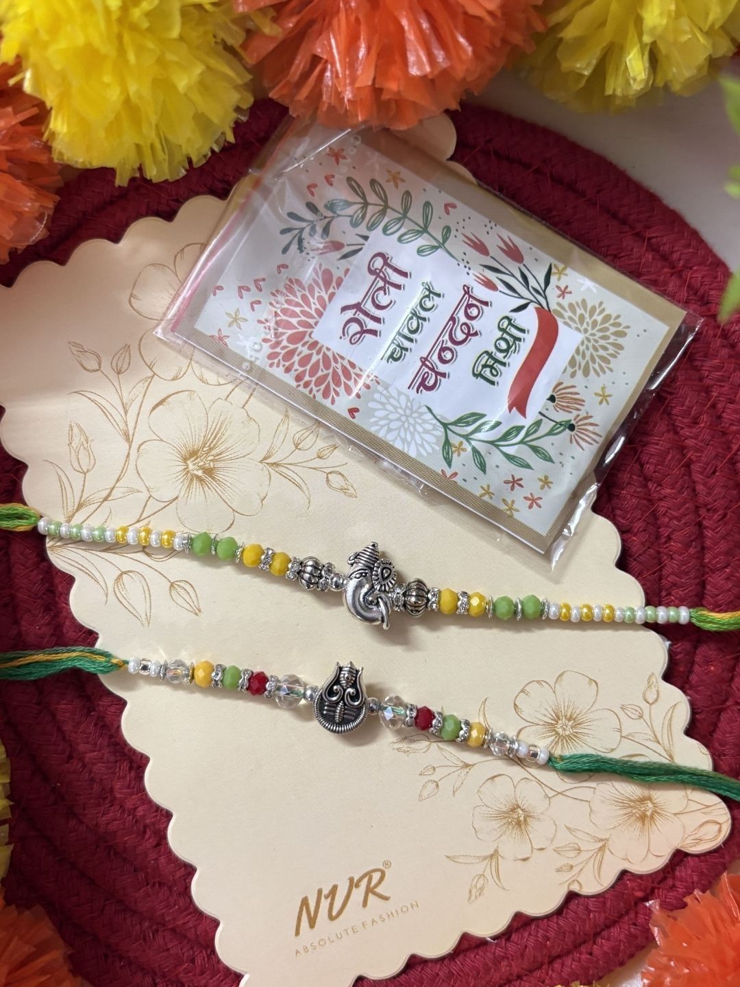 Anouk Set Of 2 Multicolor Religious Thread Rakhi With Roli Chawal Chandan Mishri