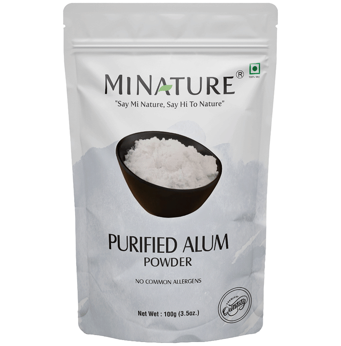 Miniature purified alum powder face pack in a small container, ready for skincare use.