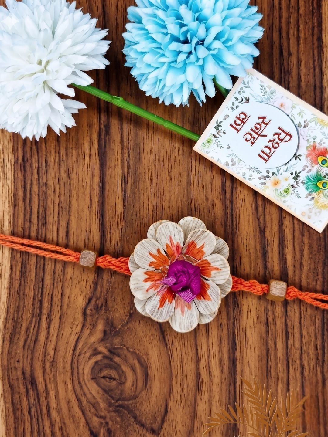 Anouk Multicolor Floral Design Plant Seed Rakhi With Roli Chawal Chandan Mishri