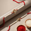 Dhiyona Set Of 2 White Pearls Om & Ganesh Ji Thread Rakhi With Roli Chawal Chandan Mishri