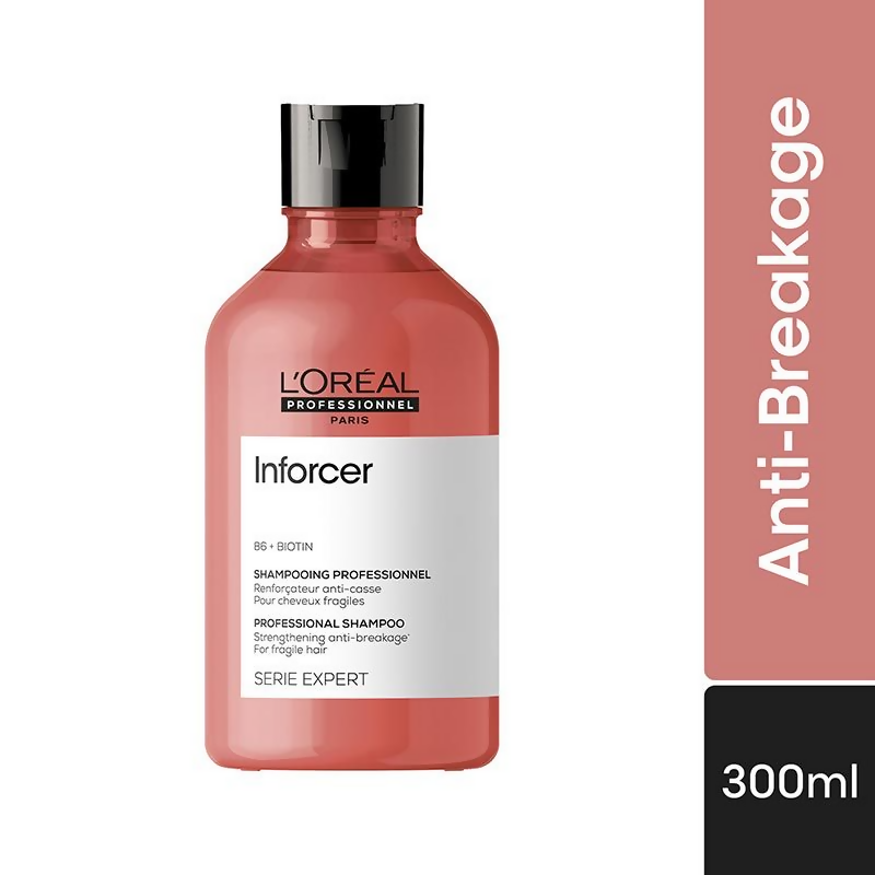 L'Oreal Professionnel Inforcer Shampoo with biotin and vitamin B6 for reducing hair breakage, shown in a sleek shampoo bottle.