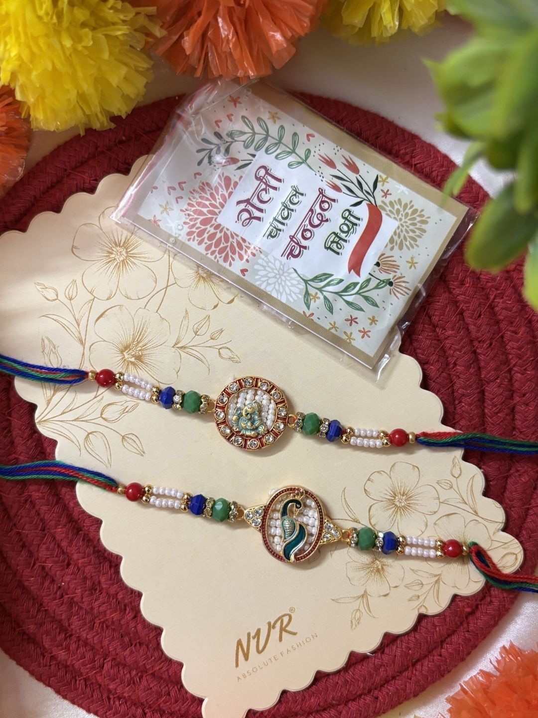 Anouk Set Of 2 Multicolor Peacock Design Rakhi With Roli Chawal Chandan Mishri