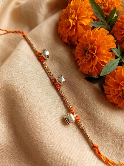 Anouk Golden Ghungroo Thread Rakhi With Roli Chawal Chandan Mishri