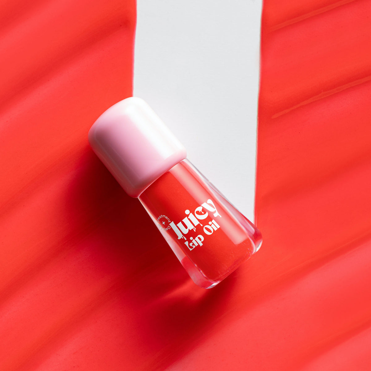 Gush Beauty Balmy Glossy Tinted Lip Oil in Cherry Red, showing smooth, shiny lips with a vibrant red tint.