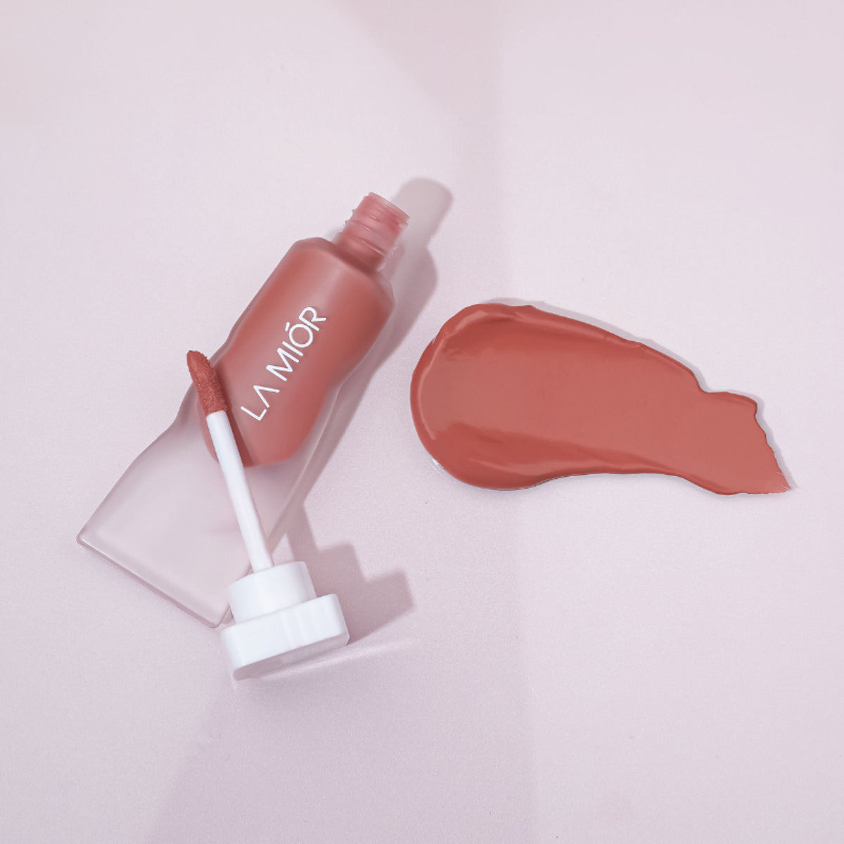 La Mior Can Do It All Velvet Liquid Lipstick in Limitless shade, featuring a smooth, velvety finish on a sleek lipstick tube.