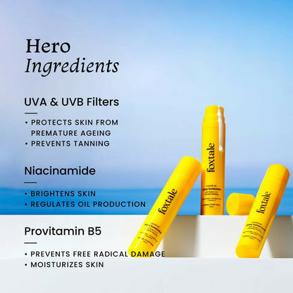 Foxtale Dewy Sunscreen SPF 70 PA++++ with Niacinamide, Vitamin E, and Provitamin B5, showing the sunscreen tube with a dewy finish.