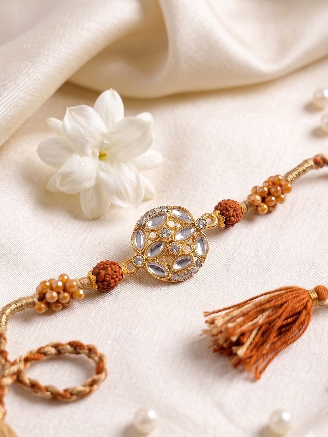 Anouk Rudraksh & Kundan Studded Gold Toned Thread Rakhi With Roli Chawal Chandan Mishri