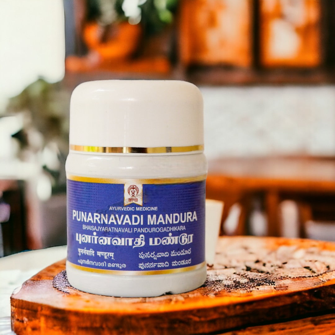 Impcops Punarnavadi Mandura Ayurvedic supplement in a glass bottle with capsules, traditional herbal medicine for health support.