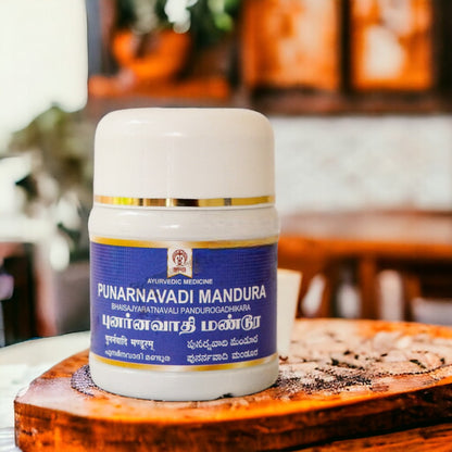 Impcops Punarnavadi Mandura Ayurvedic supplement in a glass bottle with capsules, traditional herbal medicine for health support.