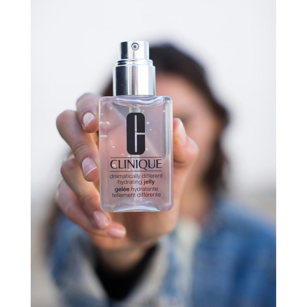 Clinique Dramatically Different Hydrating Jelly in a clear jar with a blue lid, showing the moisturizing gel inside.