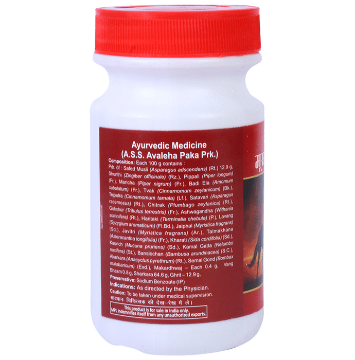 Bottle of Multani Musli Pak Ayurvedic syrup in a clear plastic bottle with label showing the product name and brand.