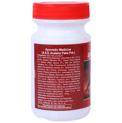 Bottle of Multani Musli Pak Ayurvedic syrup in a clear plastic bottle with label showing the product name and brand.
