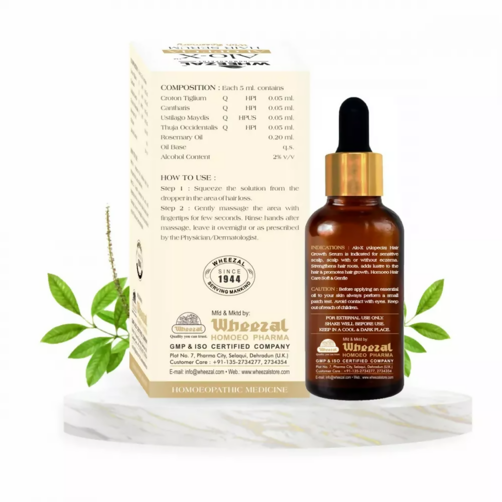 Wheezal Alo-X Alopecia Hair Serum in a bottle, designed to promote hair growth and reduce hair loss.