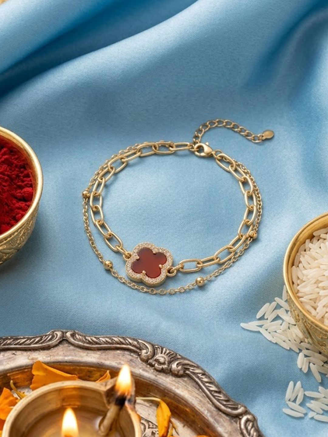 Anouk Women Artrificial Stones Gold Plated Rakhi With Roli Chawal Chandan Mishri