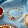 Dhiyona Women Artrificial Stones Gold Plated Rakhi With Roli Chawal Chandan Mishri
