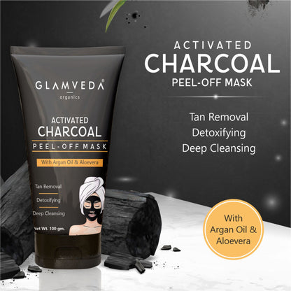 Glamveda Activated Charcoal Peel-Off Mask in a pack of two, showing the black mask applied on a woman's face for deep cleansing.