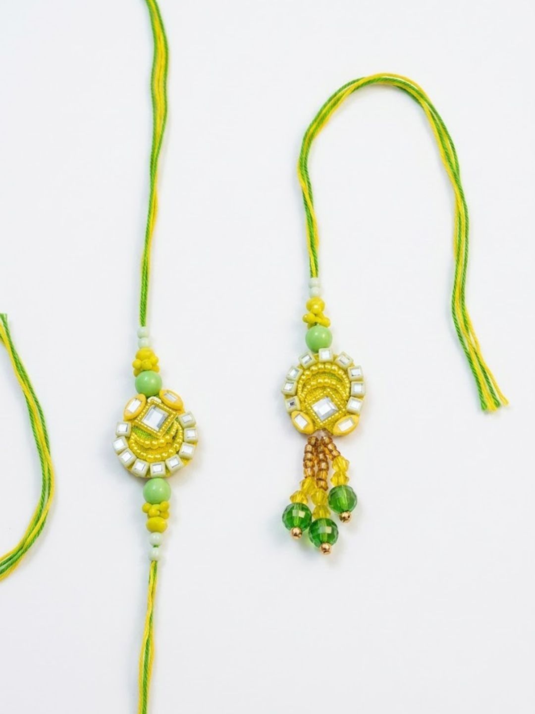 Anouk Set Of 2 Artificial Beads Mirror Work Bhaiya Bhabhi Rakhi With Roli Chawal Chandan
