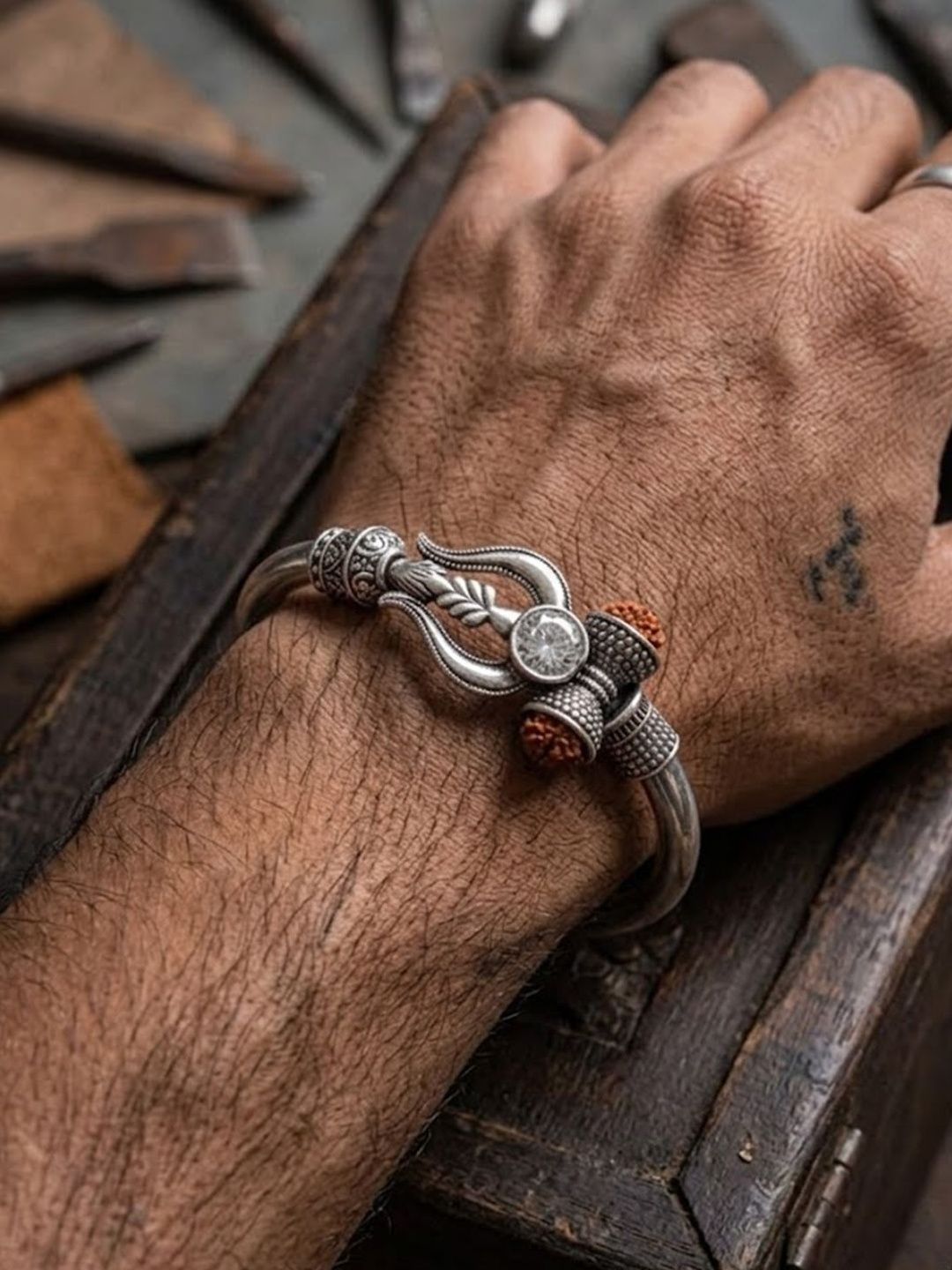 Anouk Silver Plated Trishool Design Rudraksh Rakhi Bracelet