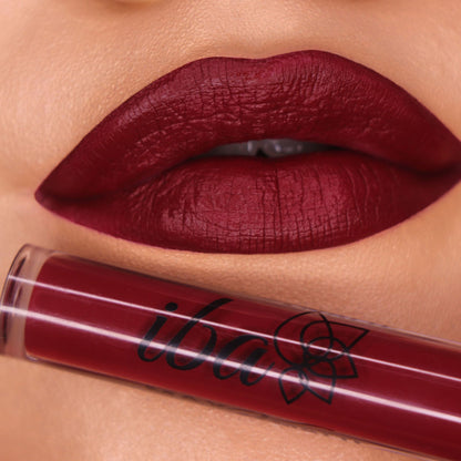 Iba Maxx Matte Liquid Lipstick in Burgundy Blush, showing the sleek tube and applicator with the rich, matte lipstick inside.