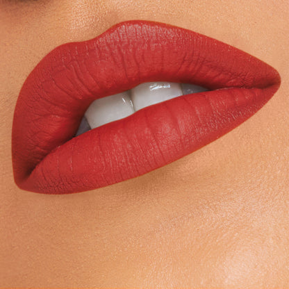LoveChild Masaba Passport Pucker Matte Lip Liner in shade Extraaaa Lit, showing the pencil and swatched on skin for precise lip lining.