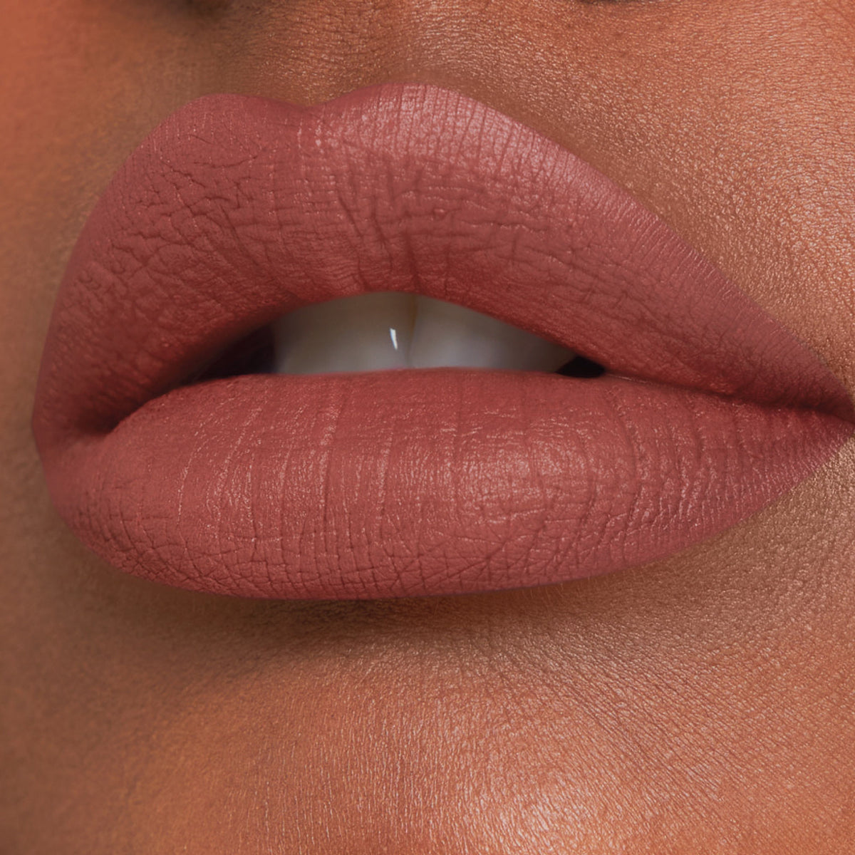 LoveChild Masaba LoveChild Masaba Passport Pucker Matte Lip Liner in Yasss Babe, featuring a close-up of the lip liner pencil with swatched color.