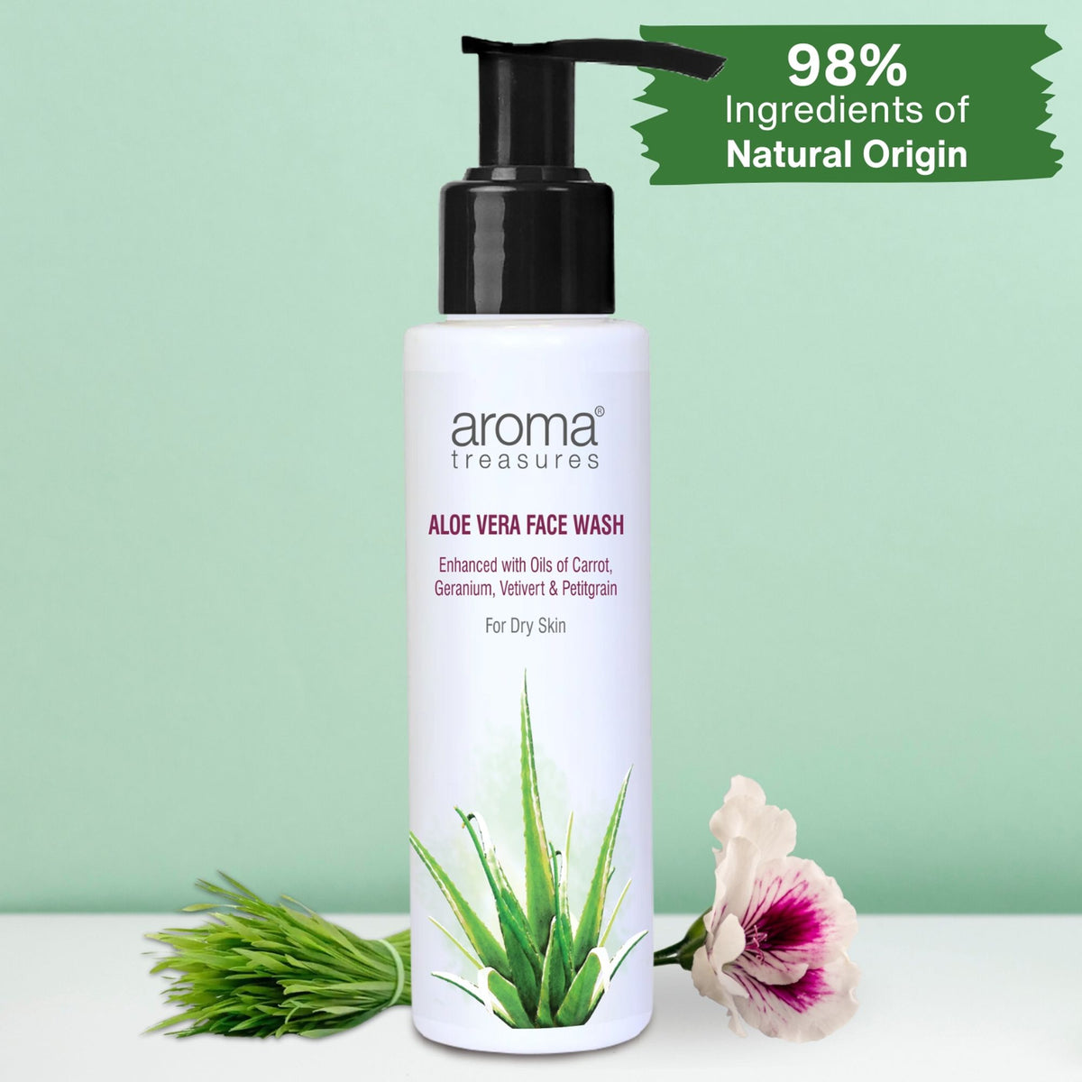Aloe Vera face wash bottle from Aroma Treasures with a clear label, featuring a green aloe vera plant illustration on the packaging.