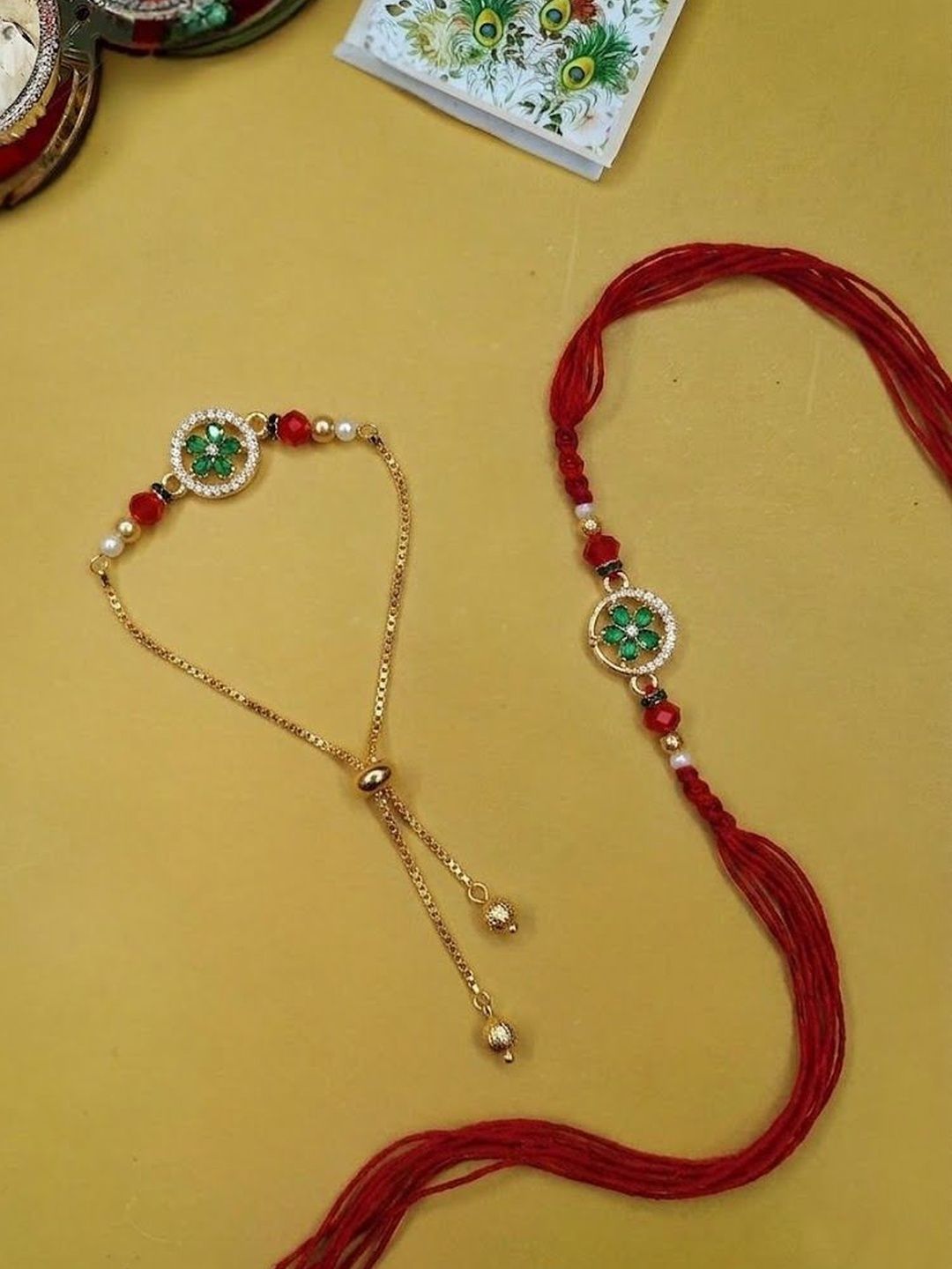 Anouk Set Of 2 Ad Drawstring Bhaiya Bhabhi Rakhi With Roli Chawal Chandan Mishri