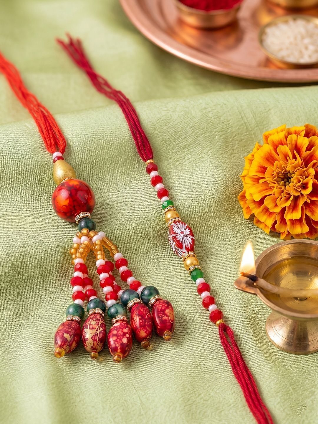 Anouk Set Of 2 Designer Red Artificial Beads Bhaiya Bhabhi Rakhi With Roli Chawal Chandan