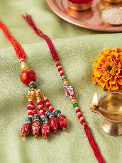 Anouk Set Of 2 Designer Red Artificial Beads Bhaiya Bhabhi Rakhi With Roli Chawal Chandan