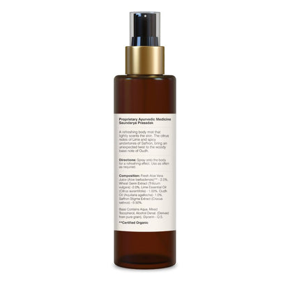 Forest Essentials Lime Saffron & Oudh scented body mist bottle with botanical design and fresh, citrusy fragrance.