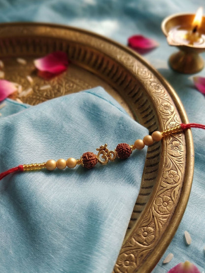 Anouk Om Design Rudraksh Thread Rakhi With Roli Chawal Chandan Mishri