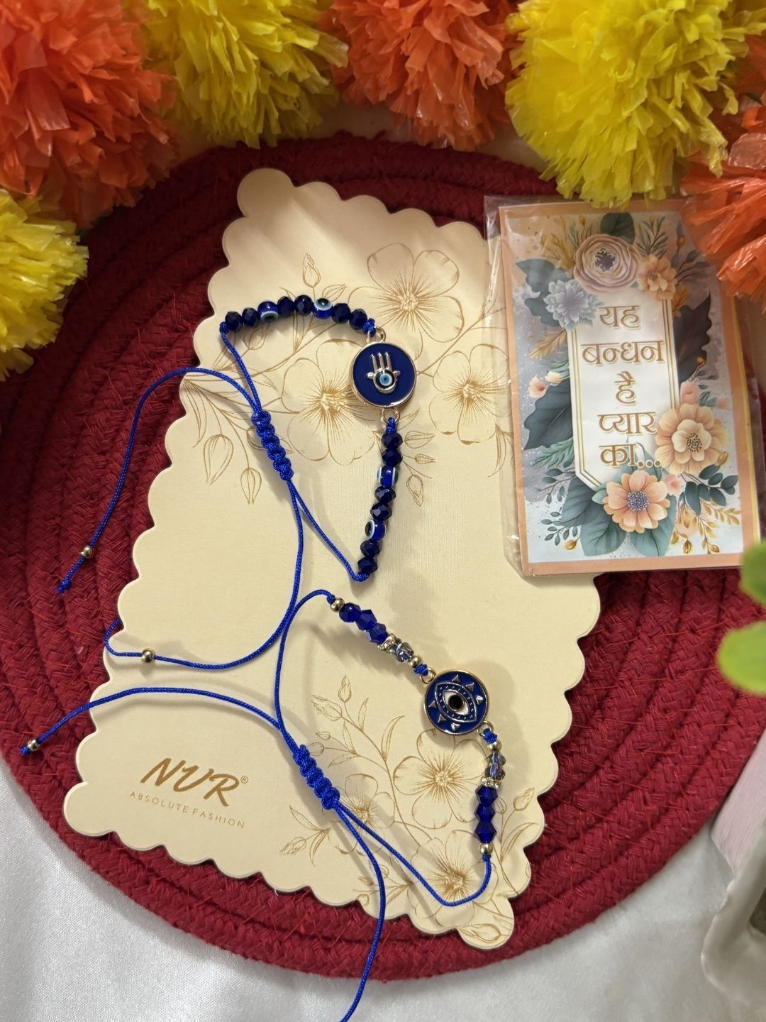 Anouk Set Of 2 Blue Evil Eye Thread Rakhi With Roli Chawal Chandan Mishri