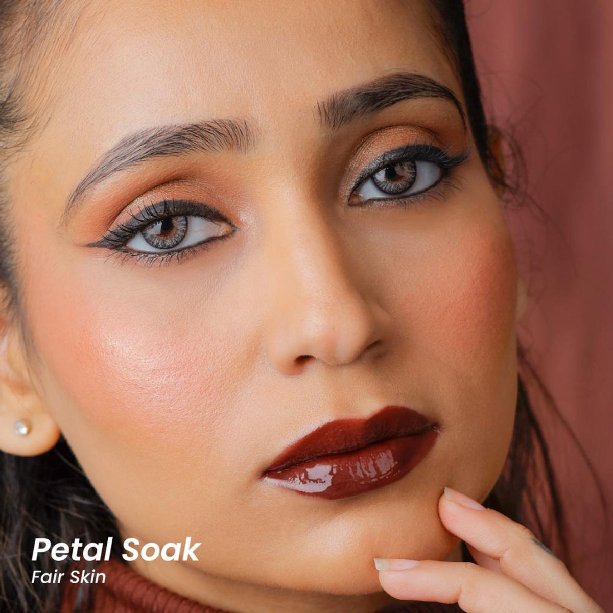 La Mior Hydrating Lip Gloss Stain in Petal Soak, a soft pink lip gloss and stain with glossy finish, displayed on a neutral background.