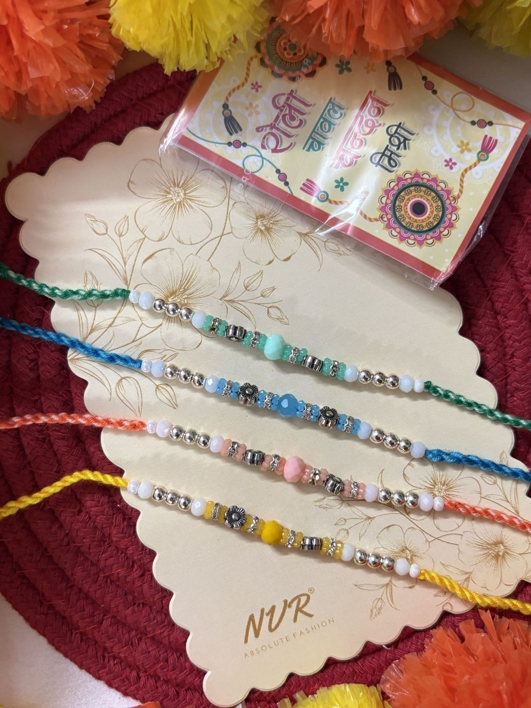 Anouk Set Of 4 Multicolor Artificial Beads Thread Rakhi With Roli Chawal Chandan Mishri
