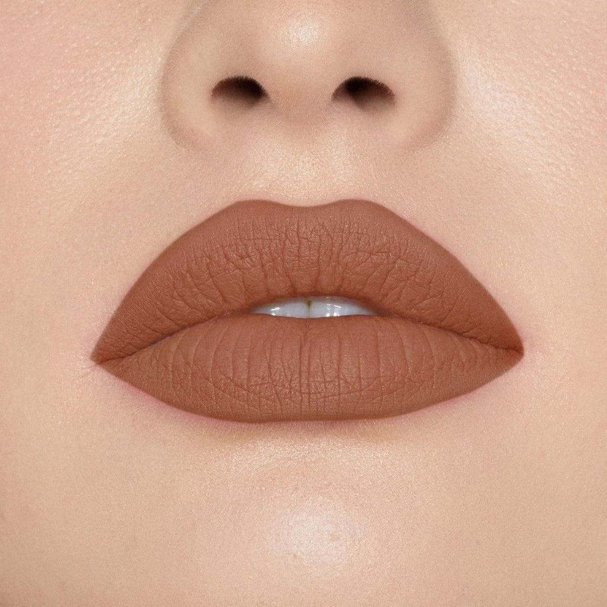 Europe Girl Silky Matte Lipstick EG-17 Espresso showing a sleek lipstick tube and the rich, espresso-colored matte lipstick inside.