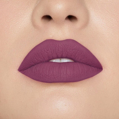 Europe Girl Silky Matte Lipstick in EG-02 Purple Petal, showing the deep purple shade and sleek lipstick tube.