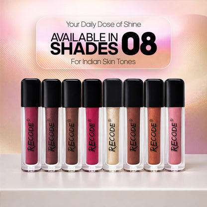 Recode Let Me Gloss You lip gloss set with eight shiny, colorful lip glosses displayed in clear tubes.