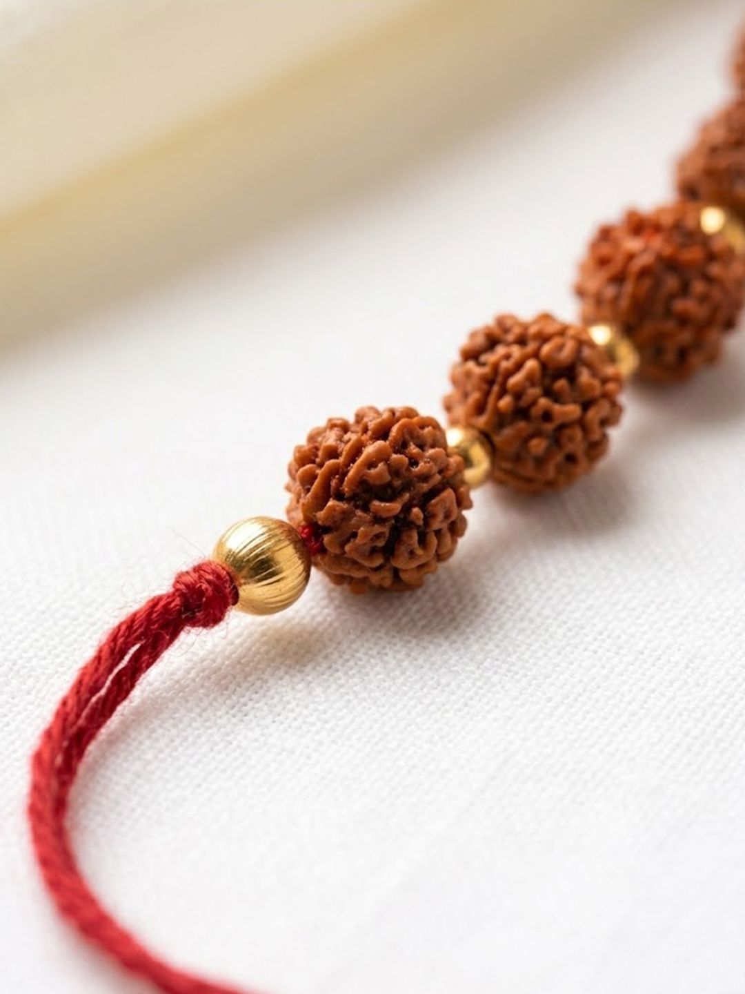 Anouk Religious Rudraksh Thread Rakhi With Roli Chawal Chandan Mishri