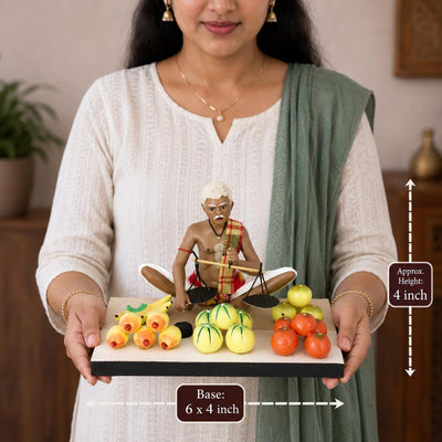 Niharika Collections Krishnanagar Handmade Clay Fruit Seller Idol, Sitting Human Figure Miniature,Hand-Painted Indian Art, Multicolour Home Décor,Golu Display & Gifting-15.2 x 10.2 x 10.2 cm