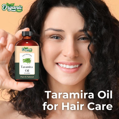 Organic Zing Zing Taramira oil in a glass bottle, showing the pure steam-distilled essential oil for skincare and haircare use.