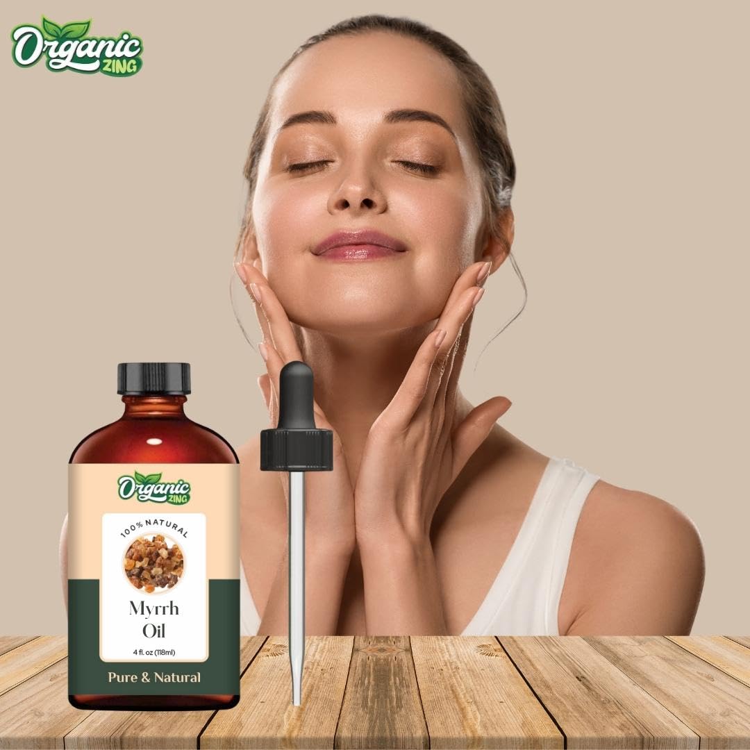Organic Zing Myrrh essential oil in a glass bottle, suitable for aromatherapy, skincare, massage, and diffusers.
