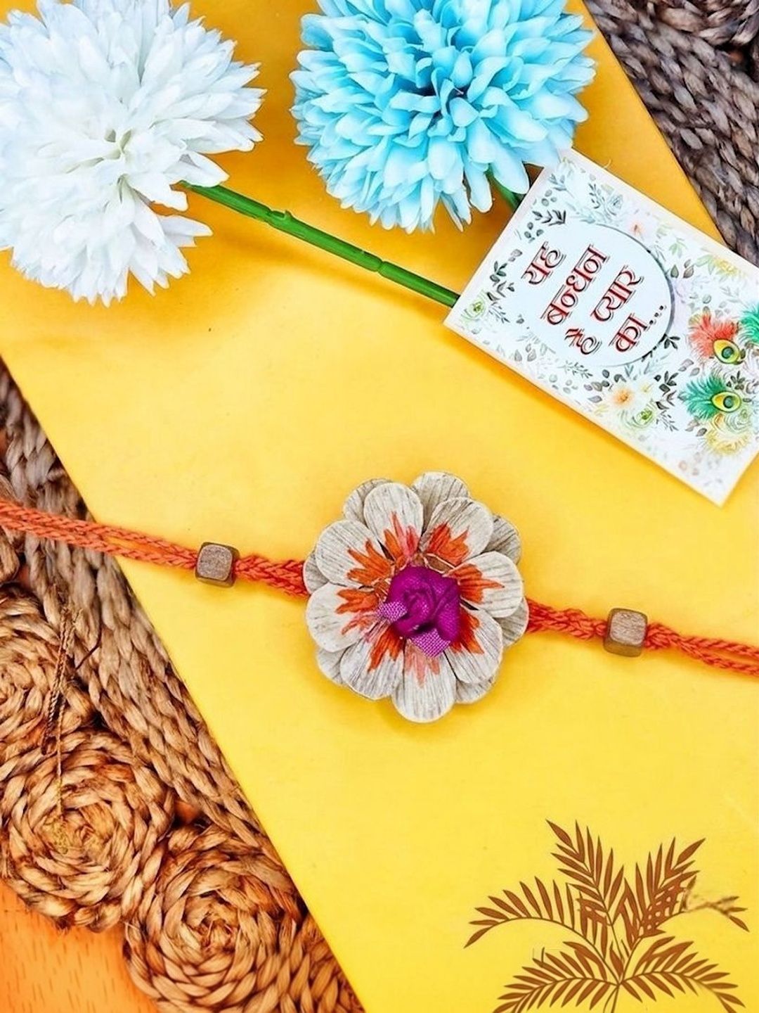 Anouk Multicolor Floral Design Plant Seed Rakhi With Roli Chawal Chandan Mishri