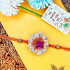 Dhiyona Multicolor Floral Design Plant Seed Rakhi With Roli Chawal Chandan Mishri